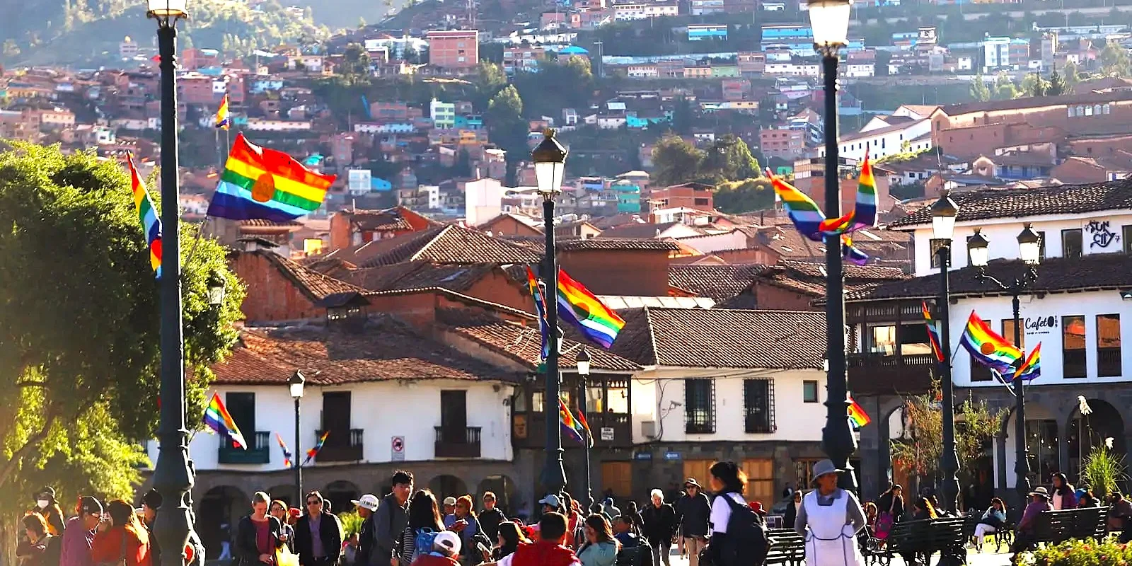Official seven-stripe rainbow flag flying in the Plaza de Armas in Cusco, Peru