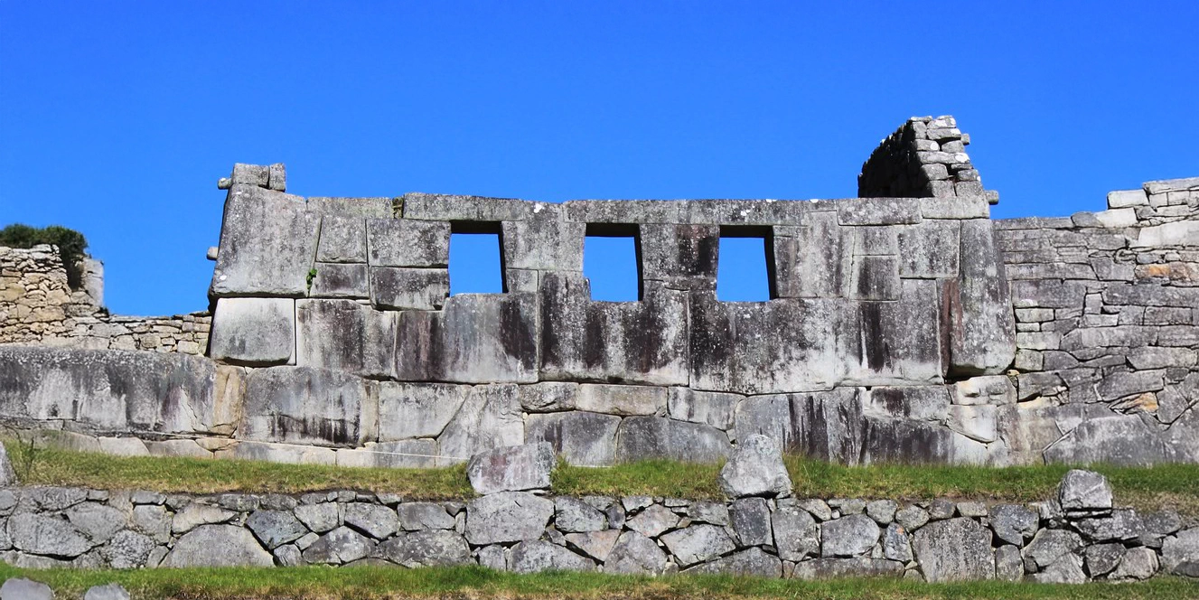 Frontal view of the three windows at the sacred Inca temple, showcasing the master stonework of the Inca Empire.