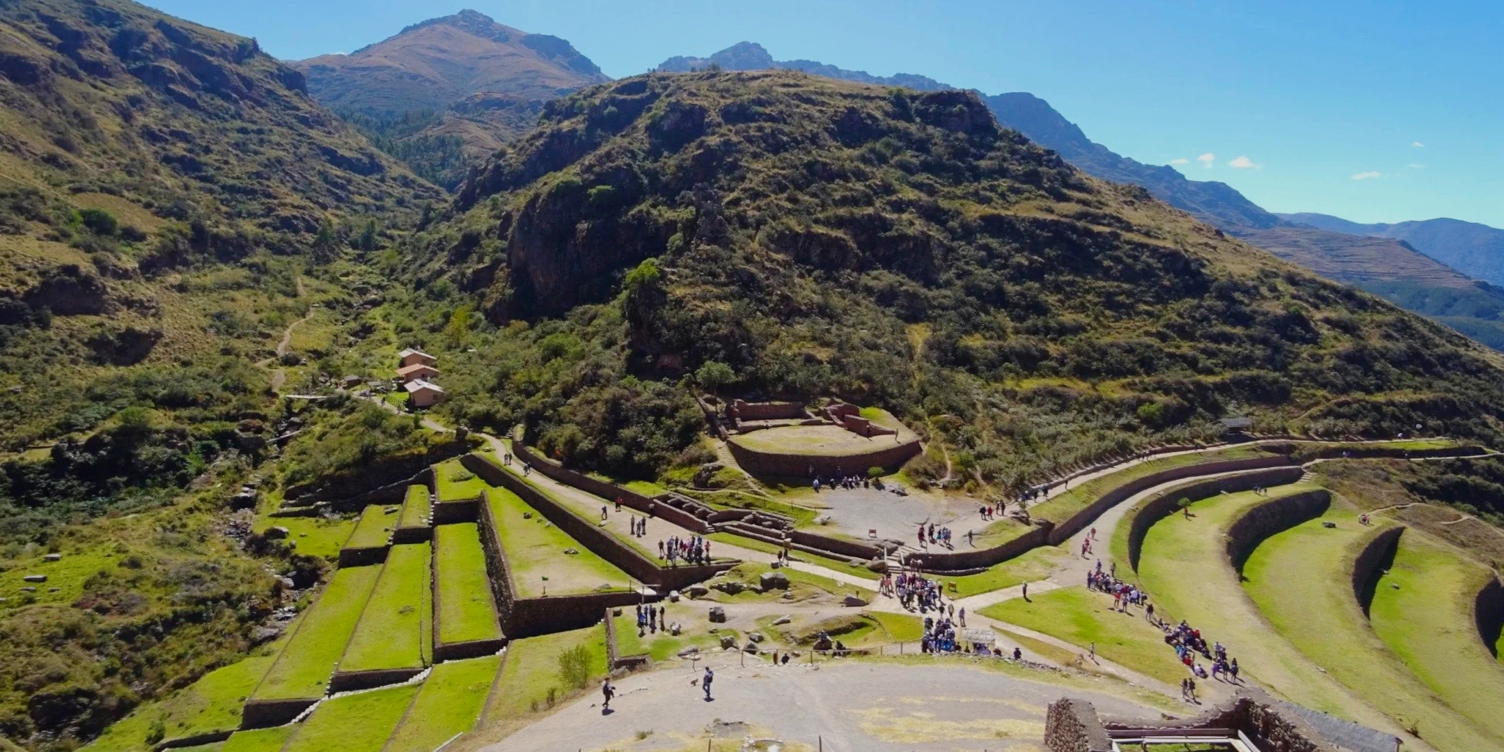 Panoramic view of the vast agricultural terraces and ruins of Pisac overlooking the mountains of the Sacred Valley of the Incas.