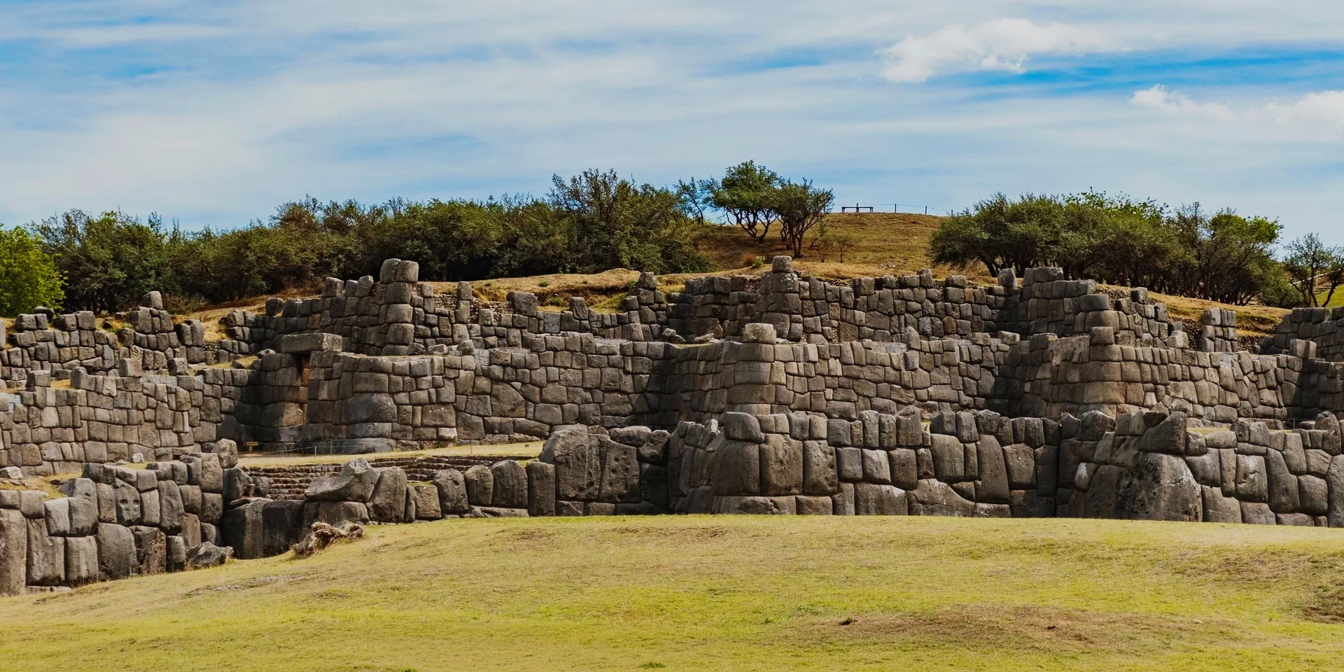 Massive zigzagging stone walls of the Sacsayhuaman archaeological site near Cusco.
