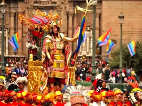 Actor dressed as the Inca on a golden throne during the reenactment of the Inti Raymi festival in the Plaza de Armas in Cusco, Peru