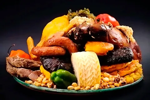 Detailed view of a Chiriuchu plate showcasing various ingredients like roasted meat, toasted corn, and cheese.