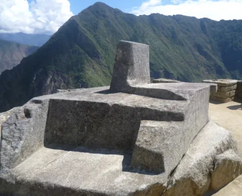 The Intihuatana: Where the Incas "tied" the sun for their rituals Inca ceremonial sundial, known as Intihuatana, with mountain background