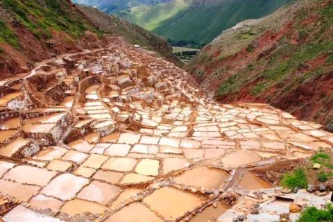 Panoramic view of the thousands of ancient salt evaporation ponds in Maras, Sacred Valley of the Incas.
