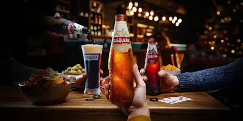 Sample of the different types of Cusqueña beer, in different containers and presentations.