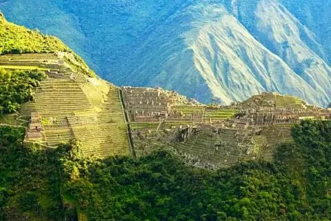 Panoramic view of the agricultural terraces and stone ruins of Wiñay Wayna on the way to Machu Picchu.