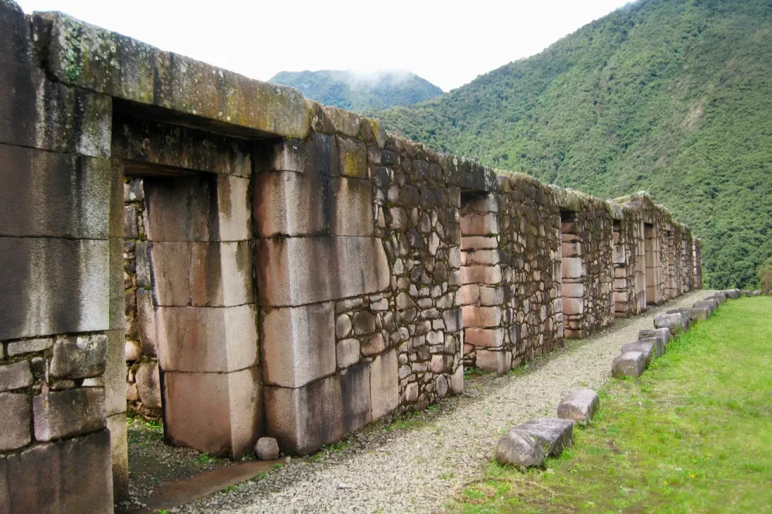 Detailed view of traditional Inca stone doorways at the Vilcabamba ruins, showcasing precise ancient architecture.