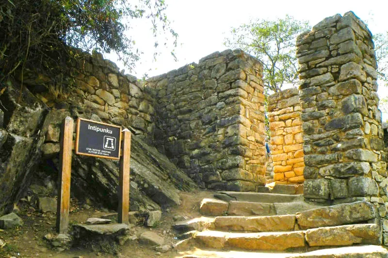 Information sign at the entrance of Intipunku, the Sun Gate, on the Inca Trail to Machu Picchu.