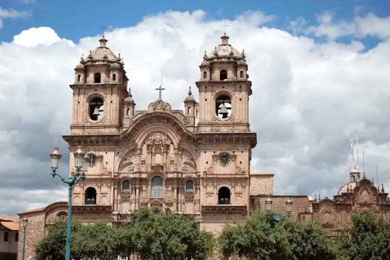 The facade of La Compañia de Jesus Church at the Plaza de Armas in Cusco, Peru.