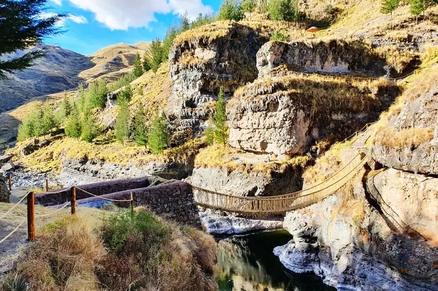 Panoramic view of the last Inca rope bridge Qeswachaka over the Apurimac river canyon