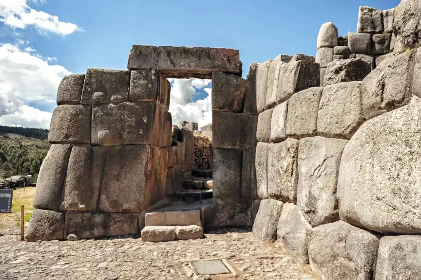 Ancient Inca Architecture at Sacsayhuaman Massive carved stone walls and ancient gateway at the Sacsayhuaman archaeological site.