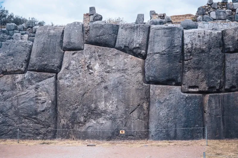 Close-up detail of the perfectly joined massive limestone blocks in the walls of Sacsayhuaman.