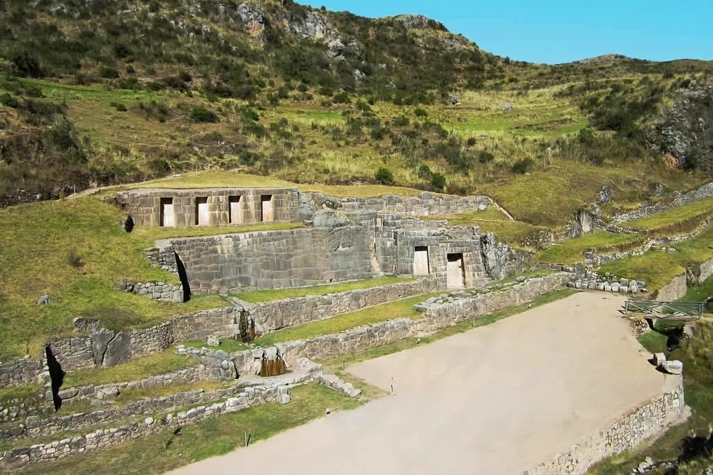 Wide view of the impressive Inca terraces and stone structures at Tambomachay near Cusco.