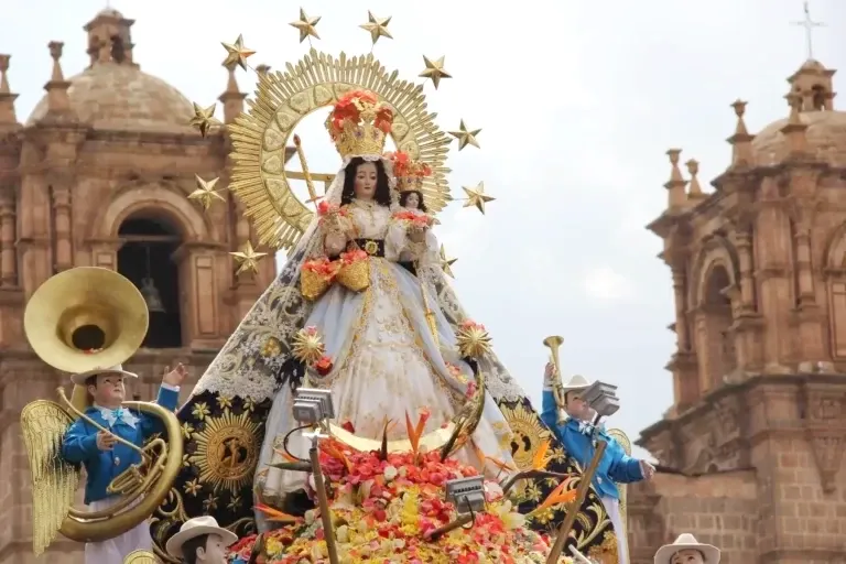 Close-up of the Virgen de la Candelaria statue during a religious procession in Peru